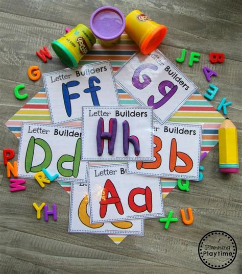 letters and numbers are arranged on the floor with colored crayons to ...