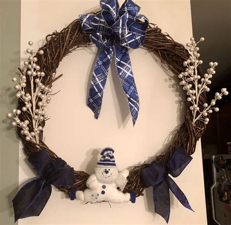 Blue and White Christmas Wreath | Unique floral arrangements, White ...