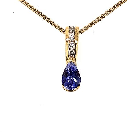 Pear Shape Tanzanite Pendant With Round Diamonds – LUCKY JEWELERS