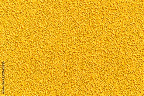 Rough cement wall painted yellow texture and seamless background ...