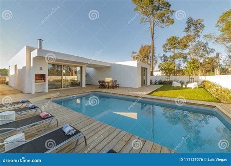 Modern House Garden Swimming Pool and Wooden Deck Stock Photo - Image ...