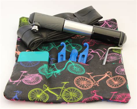 What are the essential items in a bike tool kit? goRide