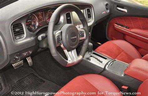 The front interior of the 2012 Dodge Charger SRT8 | Torque News