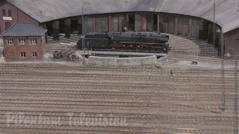 Steam Locomotive and Trains on a Model Railway Layout in HO Scale