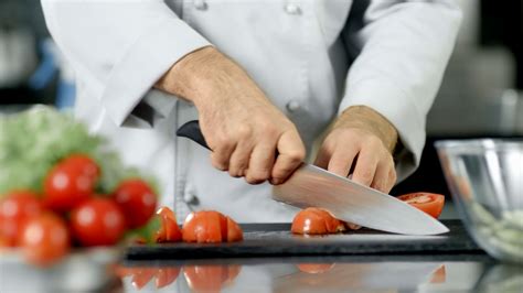 Male Chef Hands Cutting Tomato With Knife At Stock Footage SBV ...