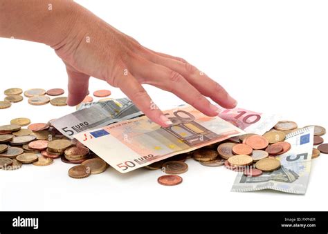 Hand grabbing money hi-res stock photography and images - Alamy