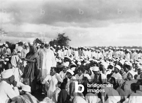 Image of Mahatma Gandhi during the 'Salt March', 1930 (b/w photo)