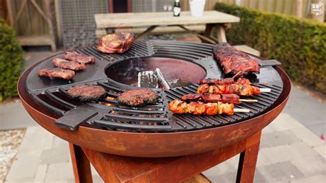 BBGrill Trinidad Fire Pit Plancha Barbecue with Wood Storage - YouTube