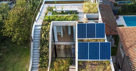 Solar-powered modern home has gardens on every floor - Curbed