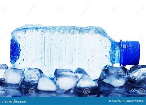 Cold Mineral Water Bottle With Ice Cubes Stock Image - Image: 13539271