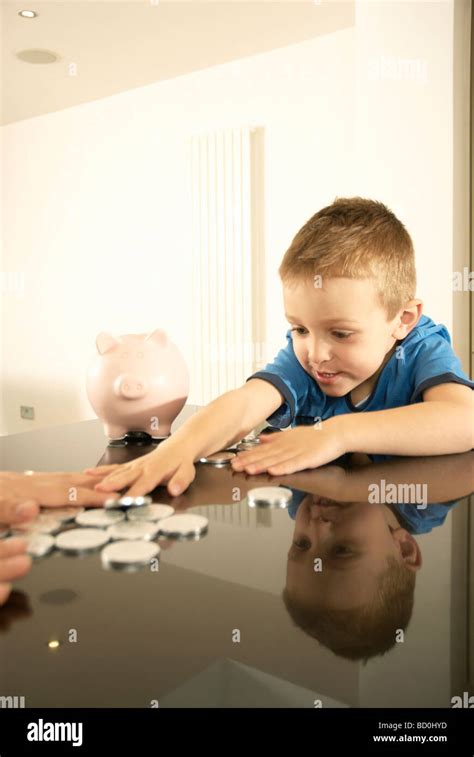 Hand grabbing money hi-res stock photography and images - Alamy