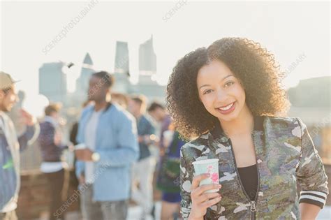 Woman drinking cocktail - Stock Image - F015/9819 - Science Photo Library