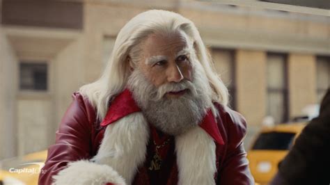 John Travolta Shines As Santa in Capital One’s Holiday Ad | DesignRush