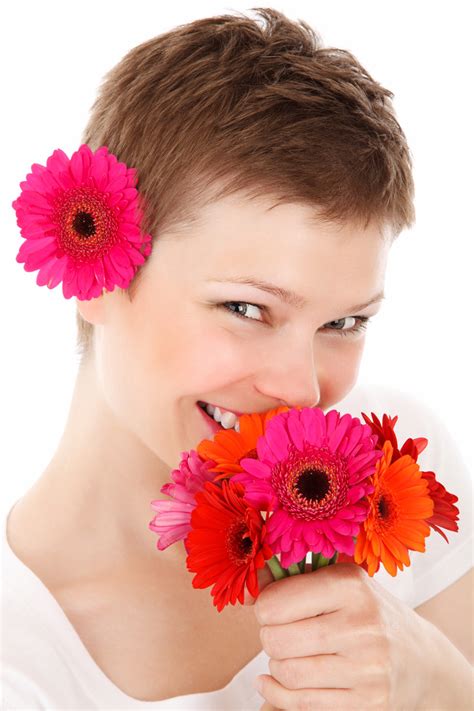 Woman Holding Flowers Free Stock Photo - Public Domain Pictures