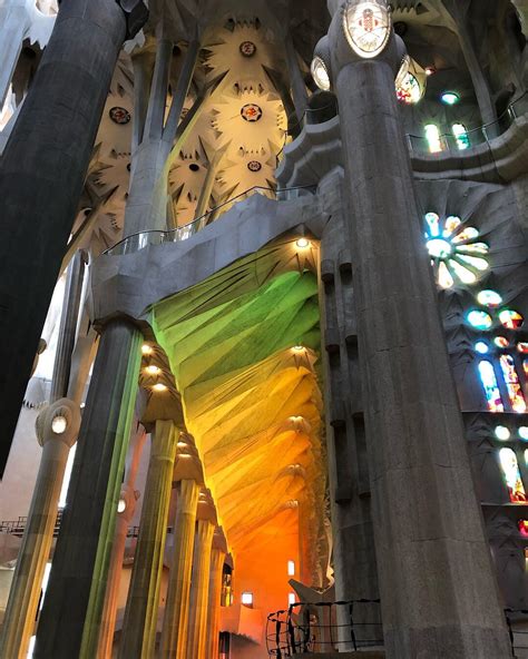 The stained glass of Sagrada Familia creates a rainbow lit passage. : r ...