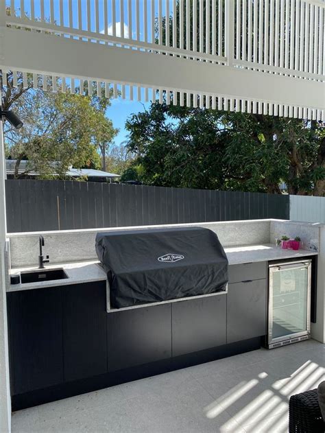 Modern Outdoor Kitchen with Grill and Sink