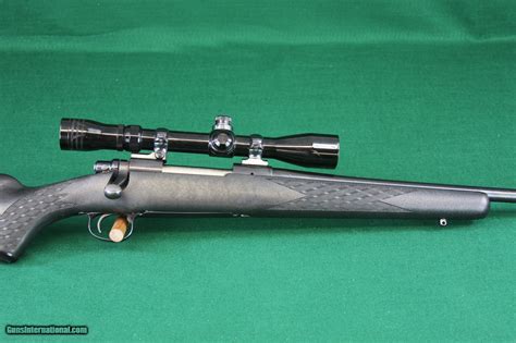 Remington 700 Bolt Action .30-06 Synthetic Stock Rifle With Redfield Lo ...