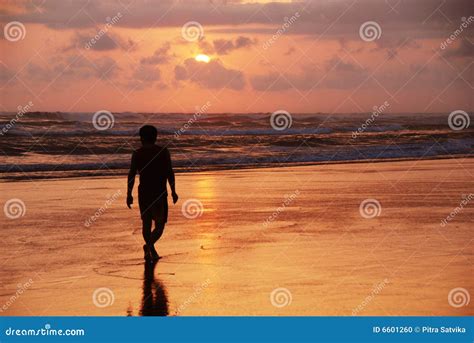 Sunset in Parangtritis, Yogyakarta Stock Photo - Image of play, people ...