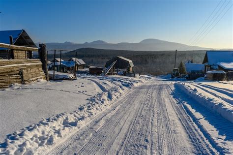 Premium Photo | Russian snowy village in winter Ural Mountains Russia