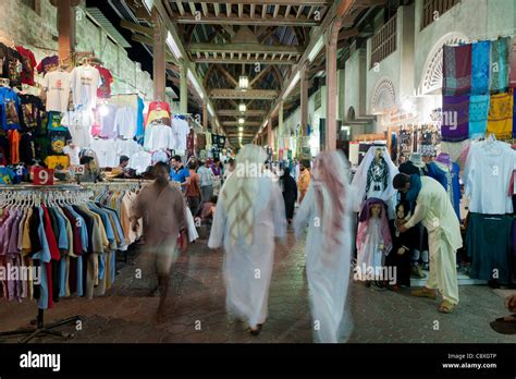 Night view of busy souq or market in Dubai UAE Middle East Stock Photo ...