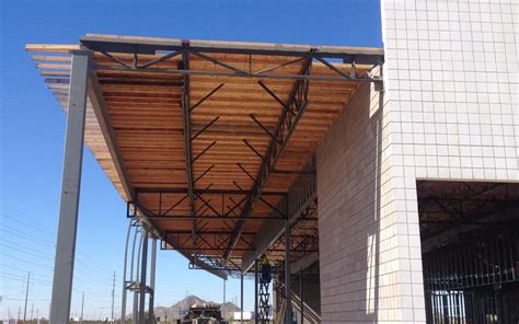 Understanding Commercial Flat Roof Systems - The Structures Group Southwest