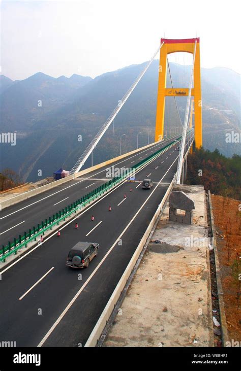 --FILE--Vehicles travel on the Sidu River Bridge crossing the valley of ...