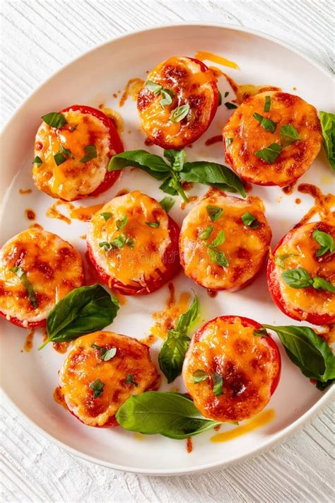 Baked Tomatoes with Mozzarella, Cheddar, Parmesan Stock Image - Image ...