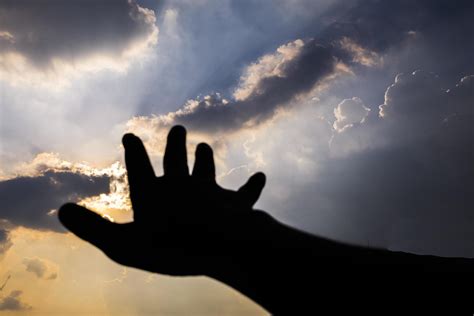 Hand reaching into the sky. Hand Reaching the Sky, connection, earth ...