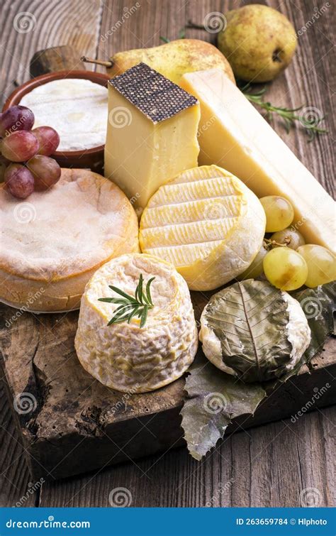 Traditional French Cheese Platter with Soft and Hard Cheese and Fruits ...