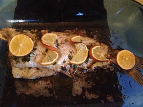 Oven-Baked Catfish in Lemon, Butter, and Wine Sauce | Delishably