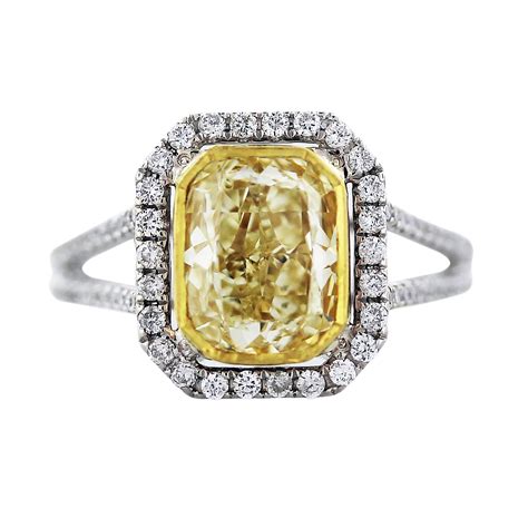 Cushion Cut Fancy Yellow Diamond Engagement Ring in 18K Two Tone Gold