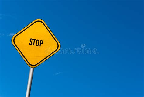 Stop - Yellow Sign with Blue Sky Stock Photo - Image of blogging ...