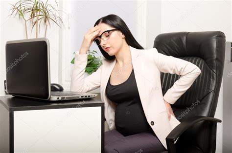 Tired pregnant woman Stock Photo by ©Sonsedskaya 125273052