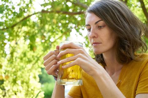 Premium Photo | A woman drinking beer