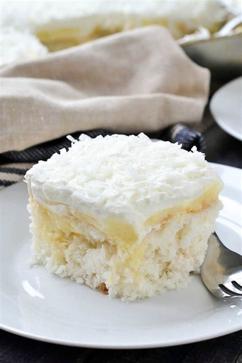 Coconut Cream Poke Cake - Mother Thyme