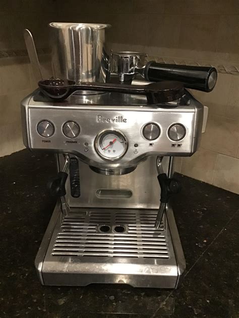 I found a Breville espresso machine, appears new in original packaging ...