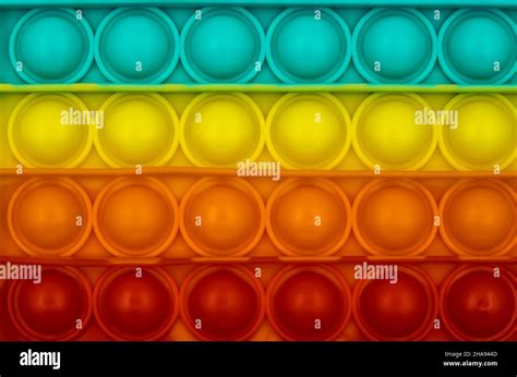 Rainbow Pop it fidget toy Stock Photo - Alamy