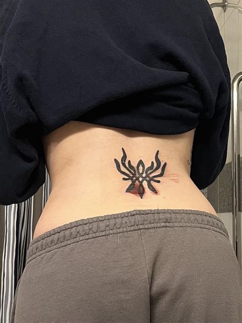 Finally got my crest tattoo in honor of logging over 500 hours played ...