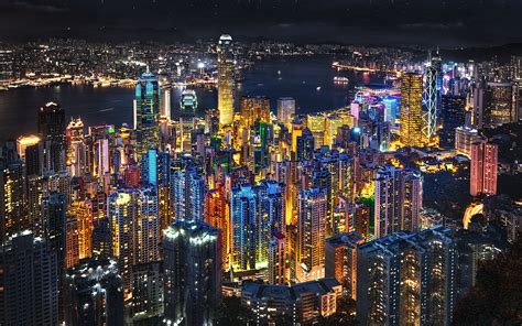 Hong Kong In The Night Lights From The Skyscraper From The Top Of The ...