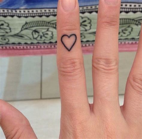 Pin by Jordan Gates on gen. inspo | Heart tattoo on finger, Dope ...