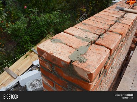 Bricklaying Photo. Image & Photo (Free Trial) | Bigstock