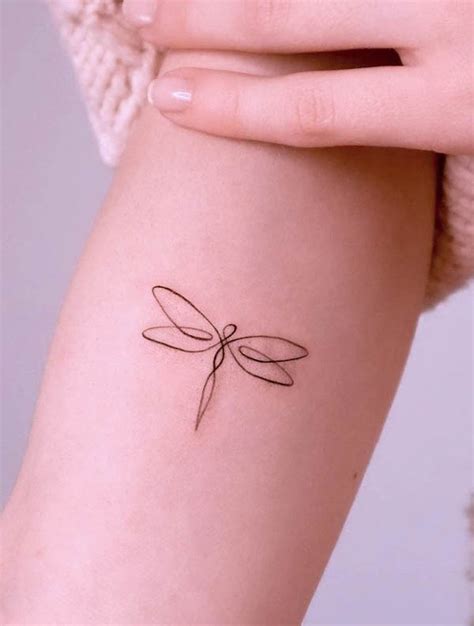 Simple Black Dragonfly Tattoo