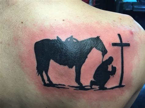 Details 65+ cowboy kneeling at the cross tattoo best - in.cdgdbentre