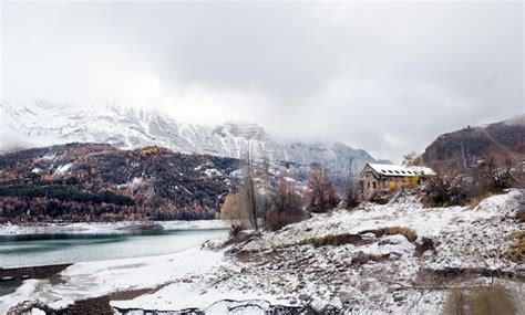 Premium Photo | Mountain landscape.snowy mountain landscape with house