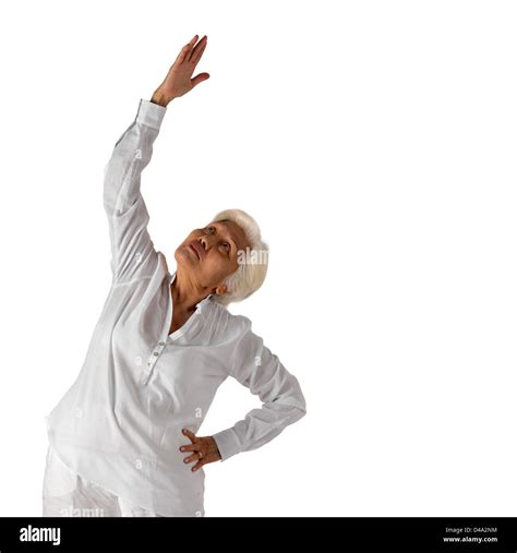 Senior citizen doing yoga Stock Photo - Alamy