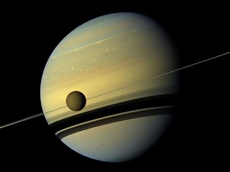 Saturn's largest moon Titan, captured by the Cassini probe. : r/spaceporn