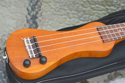 Solid body electric baritone ukulele