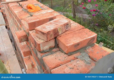 Bricklaying, Brickwork. Bricklaying Tips. How To Build a Brick Wall Stock Image - Image of tool ...