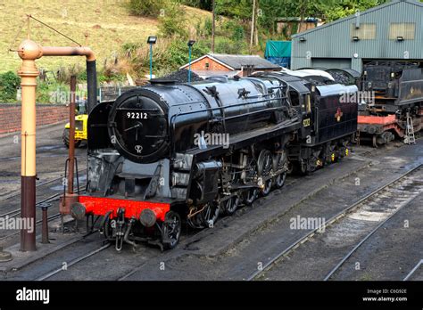 British Railways Standard Class 9F locomotive No. 92212 in the sidings ...