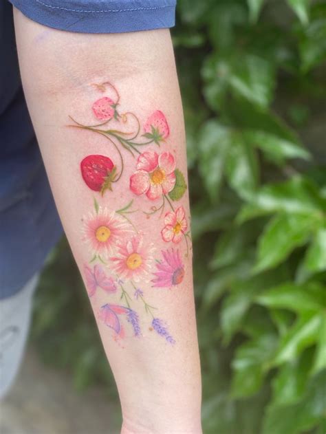 Vibrant Watercolor Strawberry Flower Tattoo